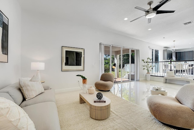 living room featuring ceiling fan