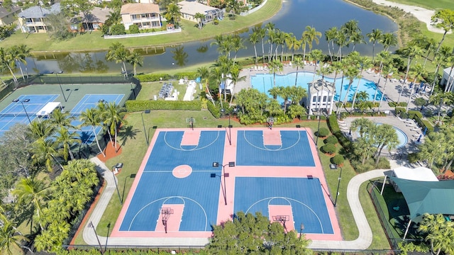 birds eye view of property featuring a water view