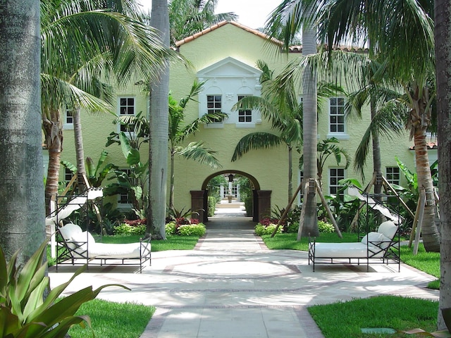 view of property's community with a patio