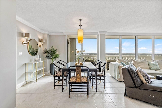 dining room featuring expansive windows and crown molding