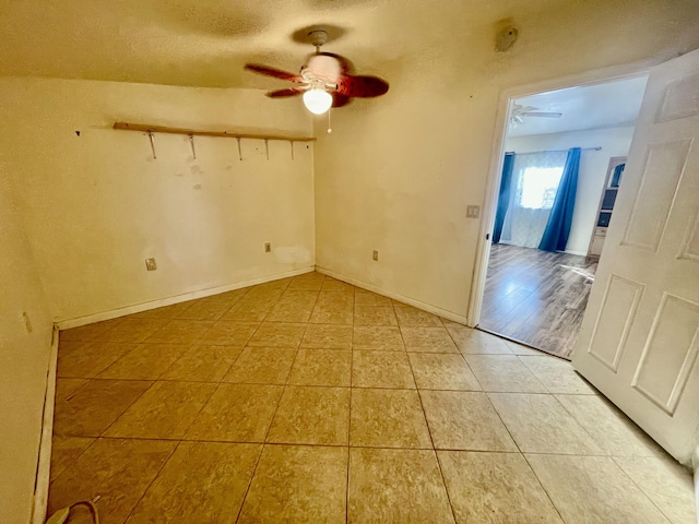 empty room with ceiling fan