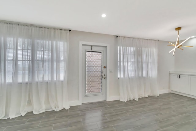 entrance foyer featuring baseboards
