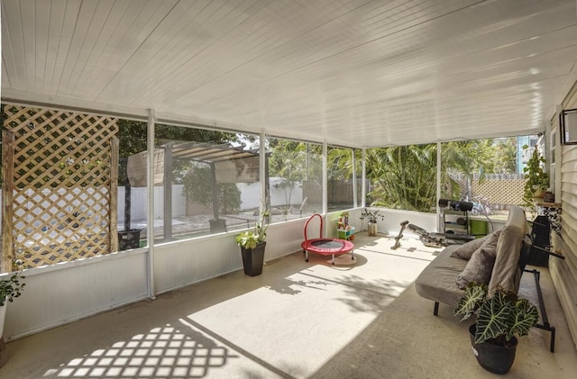 sunroom with wood ceiling