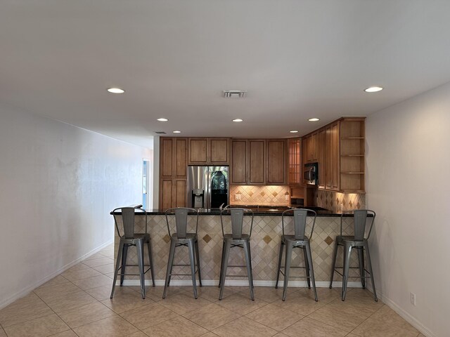 dining room featuring light tile patterned floors