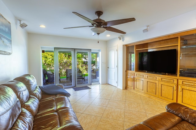 living room featuring a ceiling fan, light tile patterned floors, and recessed lighting