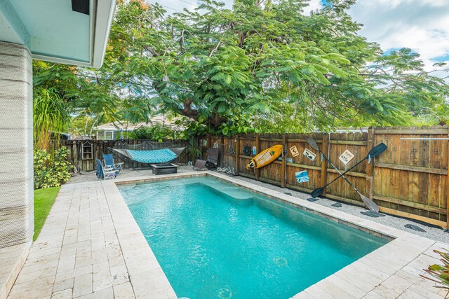 view of patio / terrace with an outdoor fire pit