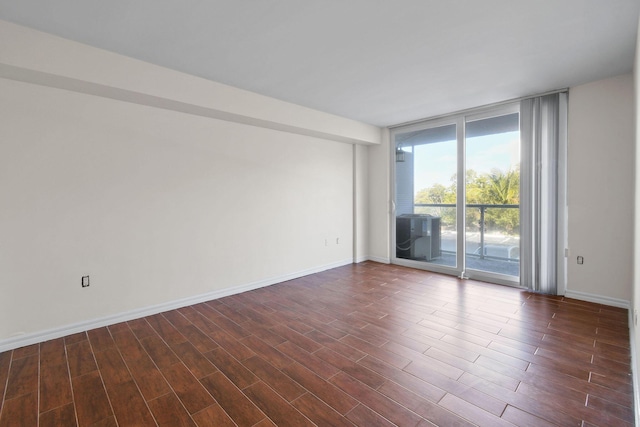 empty room featuring floor to ceiling windows