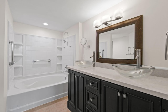 bathroom featuring vanity, tile patterned floors, and bathtub / shower combination