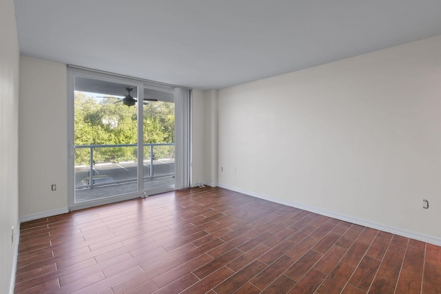 empty room featuring expansive windows