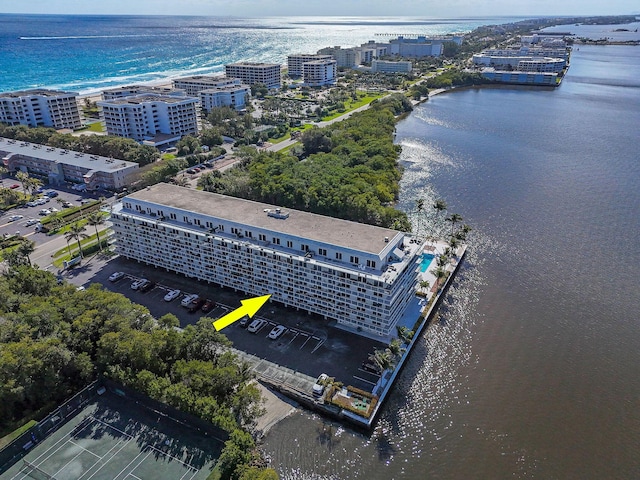 birds eye view of property featuring a water view