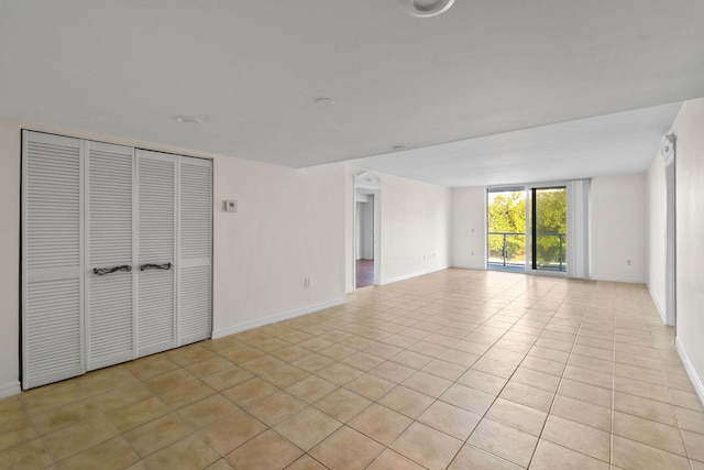 interior space featuring light tile patterned floors