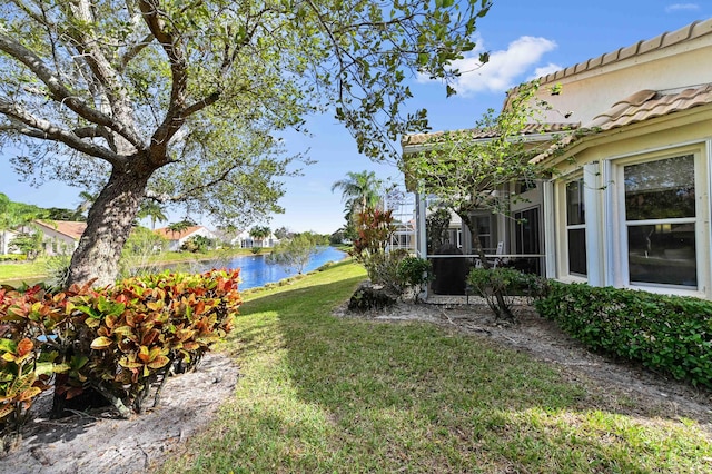 view of yard featuring a water view