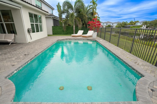 view of pool with a patio area