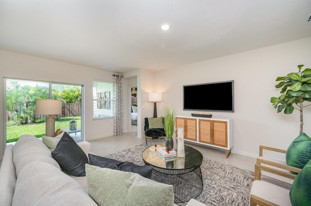 unfurnished room with light tile patterned floors