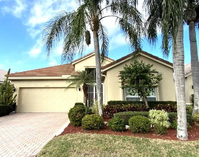 view of front of home with a garage