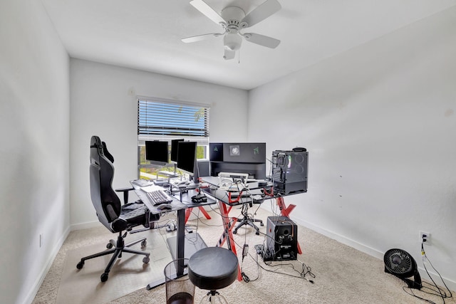 office space featuring ceiling fan and light colored carpet