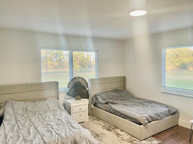 bedroom with multiple windows