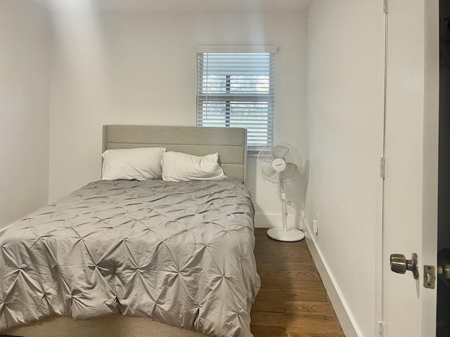 bedroom featuring dark hardwood / wood-style floors