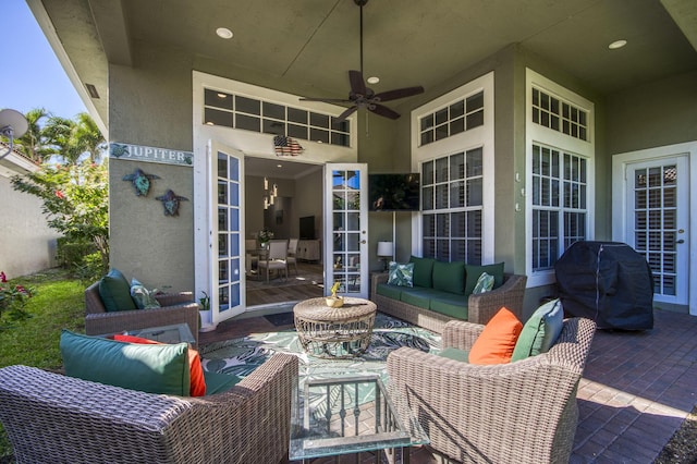 view of patio / terrace featuring ceiling fan, french doors, outdoor lounge area, and grilling area