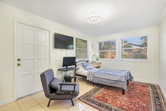 bedroom with light tile patterned floors and ornamental molding