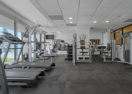 workout area with a drop ceiling