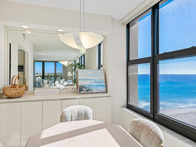 dining room with a water view