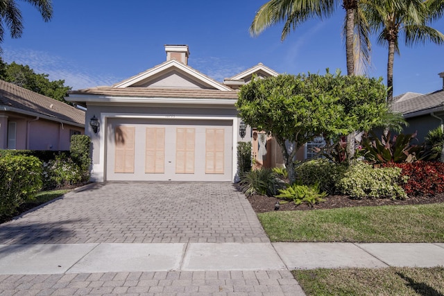 view of front of home with a garage