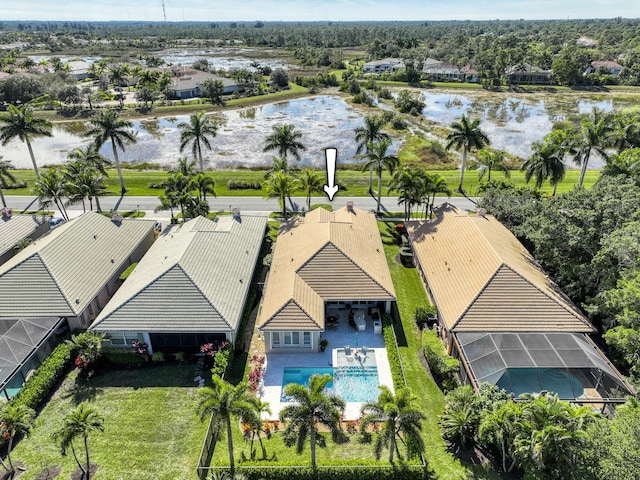 birds eye view of property featuring a water view