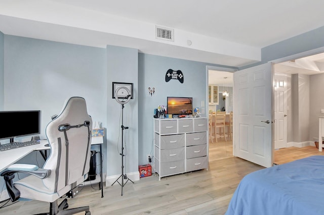 bedroom featuring light hardwood / wood-style flooring