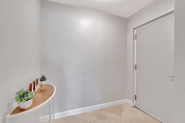 entrance foyer with light tile patterned floors