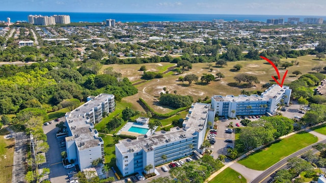 birds eye view of property featuring a water view