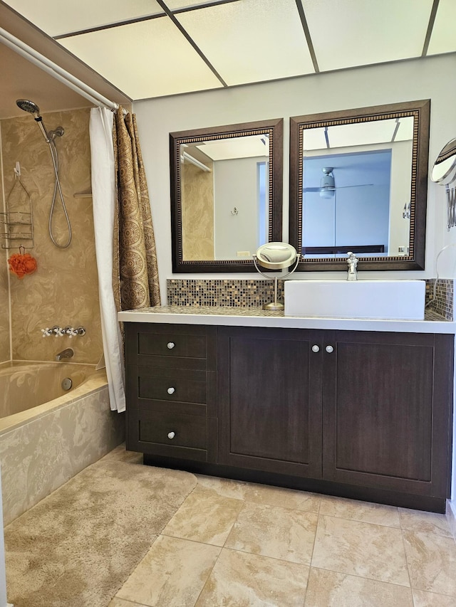 bathroom featuring vanity and shower / bath combo