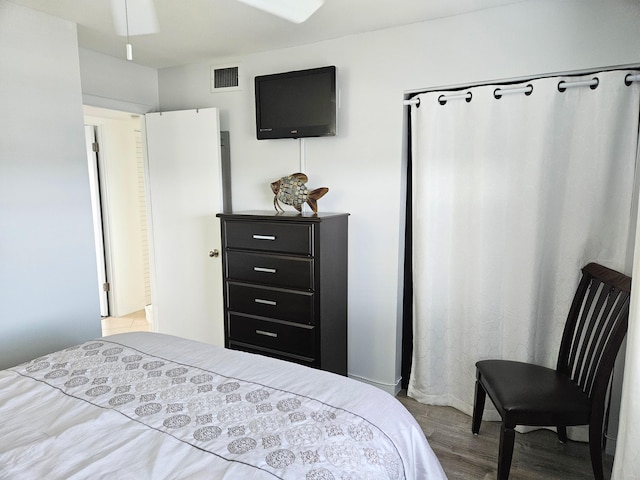 bedroom with light hardwood / wood-style floors