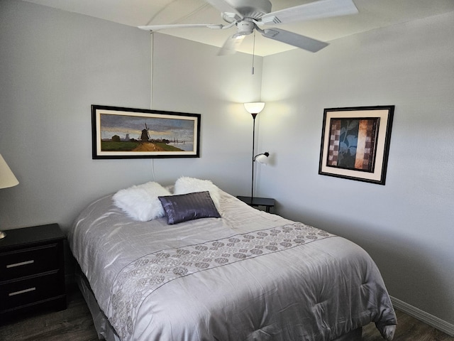 bedroom featuring dark hardwood / wood-style floors