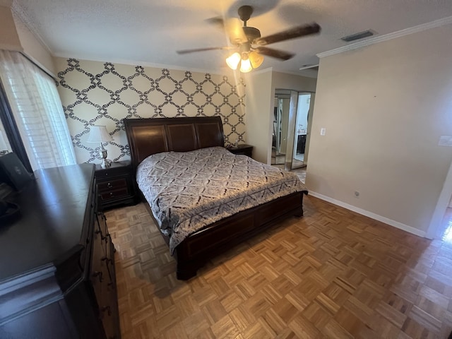 bedroom featuring a textured ceiling, ceiling fan, ornamental molding, and parquet flooring