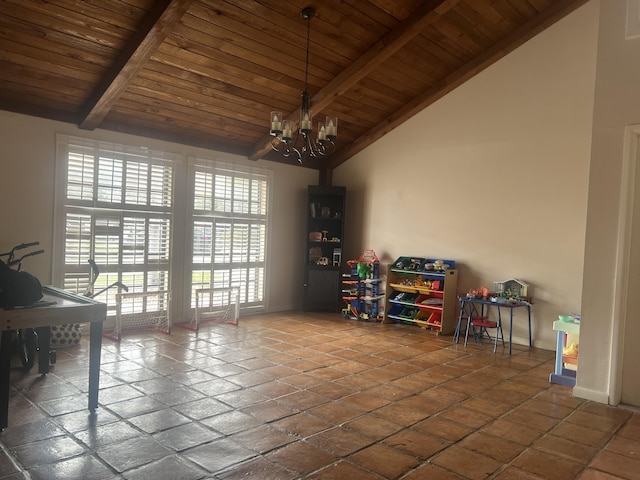 recreation room with vaulted ceiling with beams, a notable chandelier, and wood ceiling