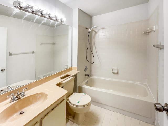 full bathroom featuring toilet, vanity, and bathing tub / shower combination