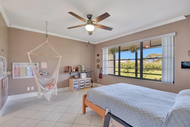 tiled bedroom featuring ornamental molding and ceiling fan