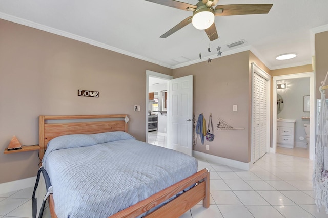 bedroom featuring ceiling fan, light tile patterned flooring, connected bathroom, and crown molding