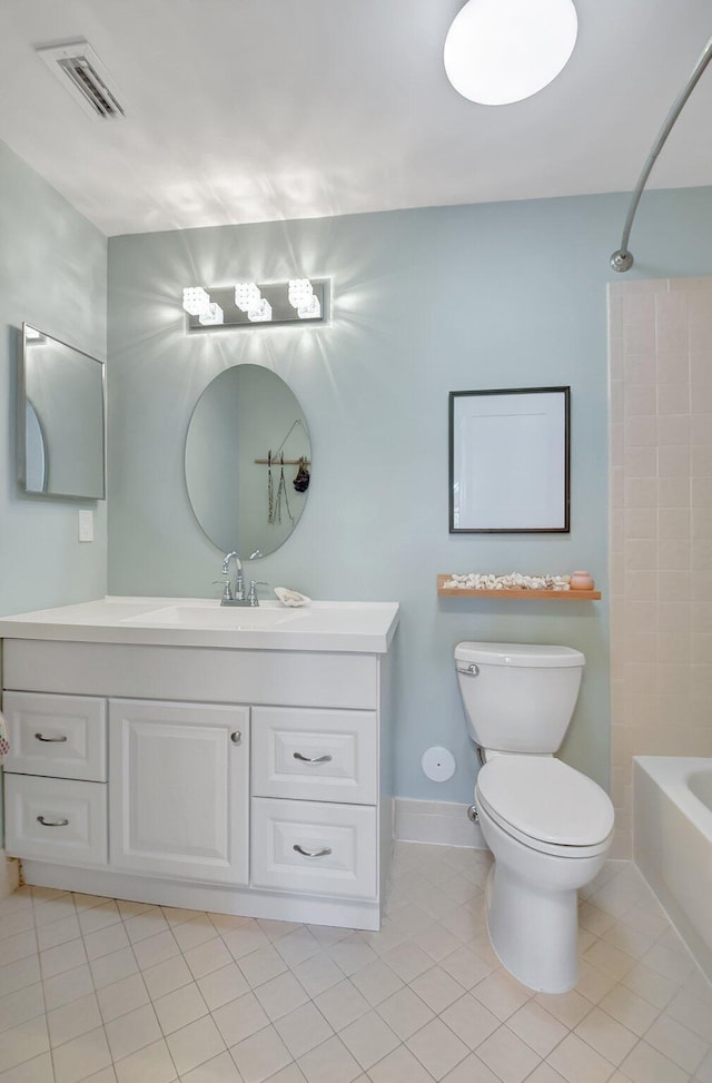 full bathroom featuring toilet, tile patterned floors, bathing tub / shower combination, and vanity