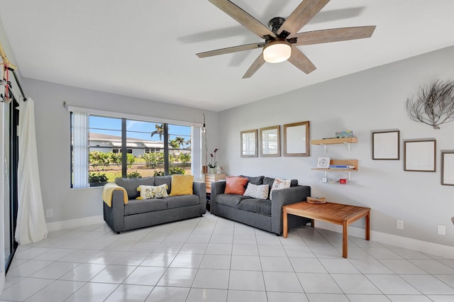 tiled living room with ceiling fan