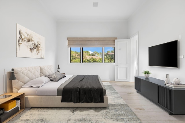 bedroom with hardwood / wood-style flooring