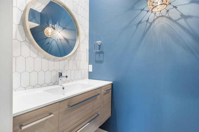 bathroom with vanity and backsplash