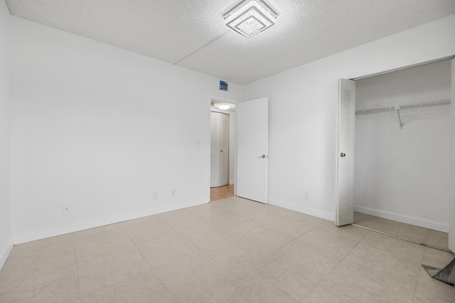 unfurnished bedroom with a closet