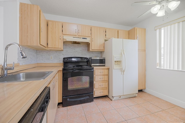 kitchen featuring ceiling fan, sink, black appliances, light brown cabinets, and light tile patterned floors