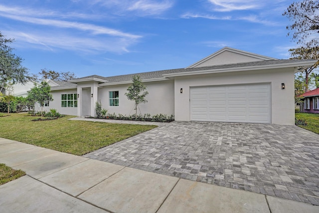 single story home with a front lawn and a garage