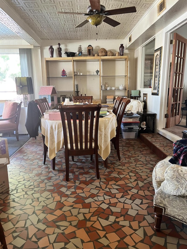 dining area featuring ceiling fan