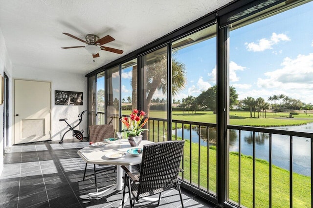 5152 Golfview Ct Unit 1825, Delray Beach, FL 33484 - sunroom featuring a water view, floor to ceiling windows, and a textured ceiling
