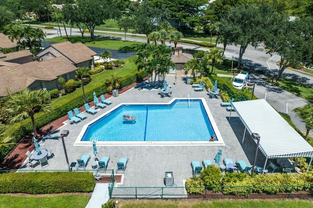 view of swimming pool featuring a patio area