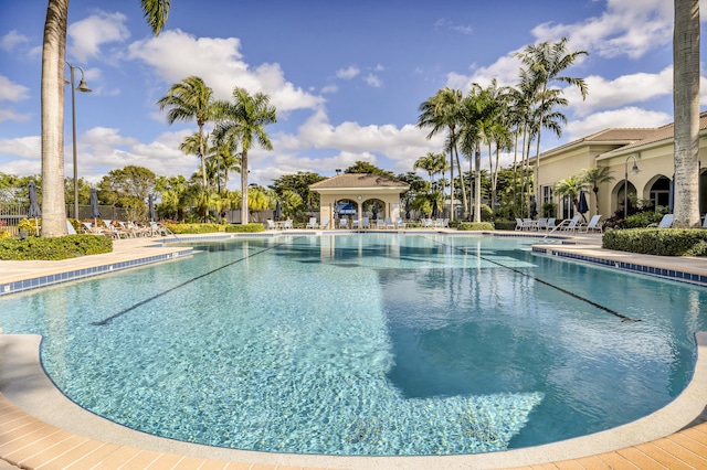 view of swimming pool with a patio